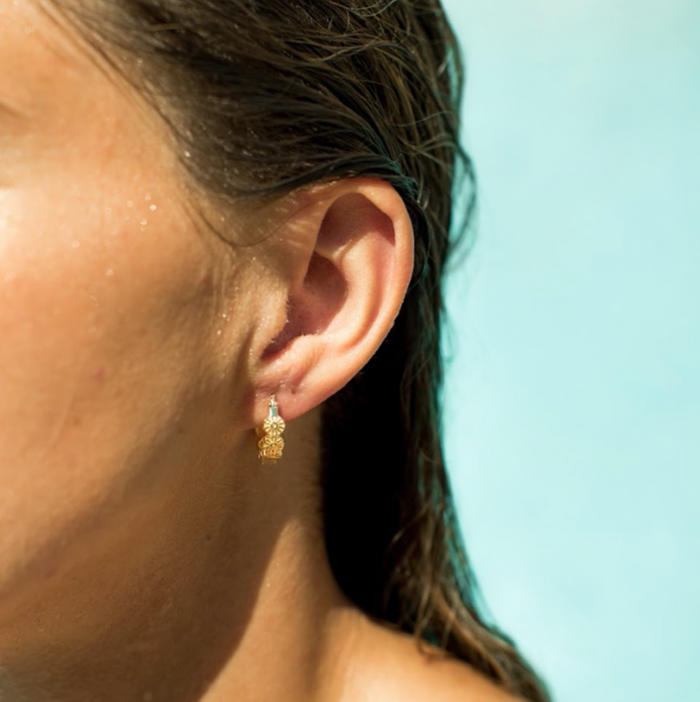 engraved flower hoops earrings worn by @ajcoastal in florida