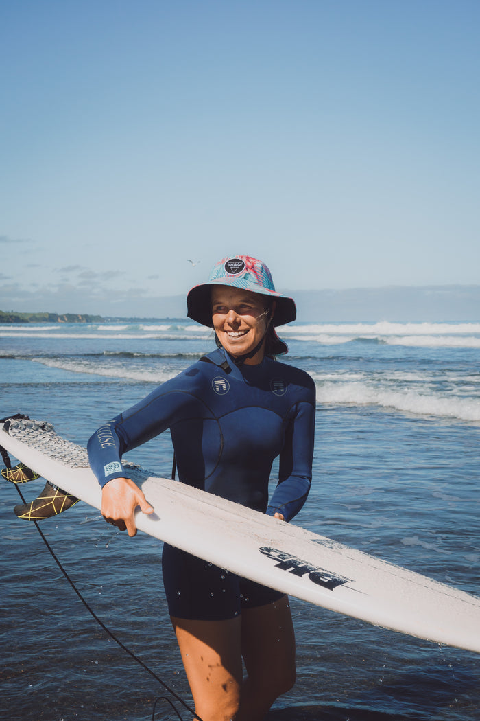 Surf hat for women, floral sun hat, water sports hat for ladies, colourful sports cap, Scribbler hat, surfing, kayaking, head wear, SUP, body boarding, sailing, fishing, sun protection, slap on a hat, sun smart, sun safe, New Zealand, kiwi, NZ, Paige Hareb