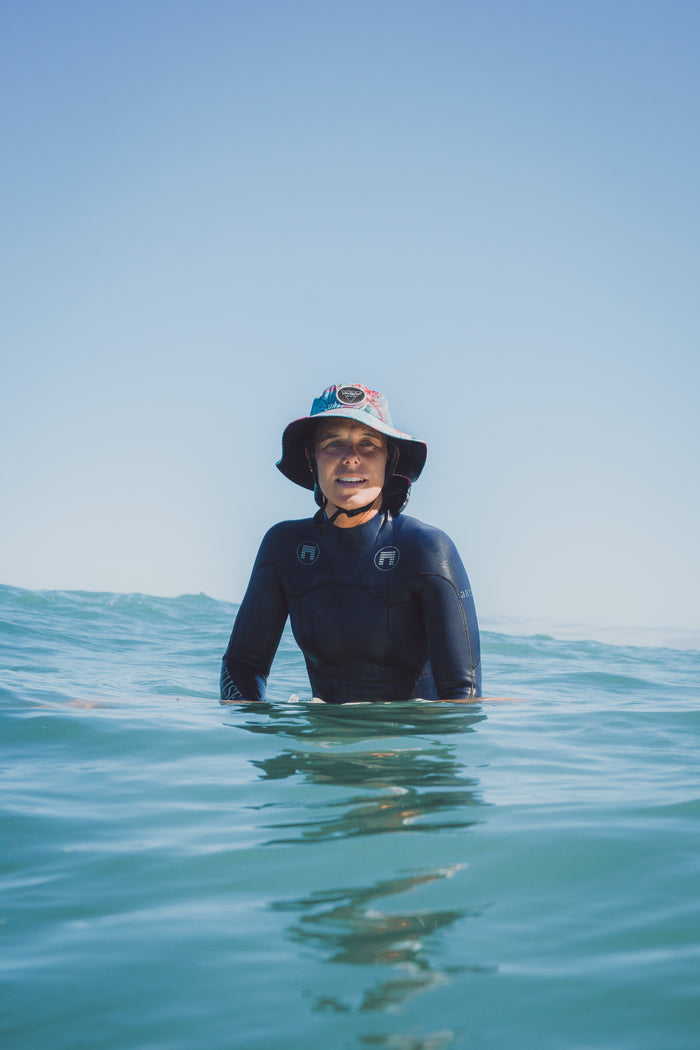 Surf hat for women, floral sun hat, water sports hat for ladies, colourful sports cap, Scribbler hat, surfing, kayaking, head wear, SUP, body boarding, sailing, fishing, sun protection, slap on a hat, sun smart, sun safe, New Zealand, kiwi, NZ, Paige Hareb